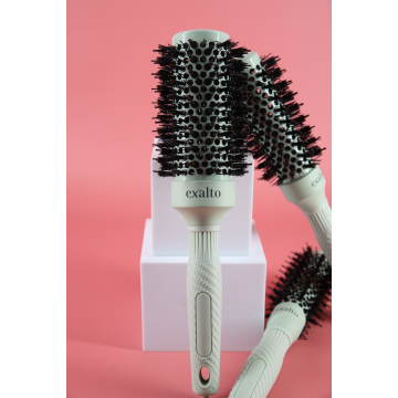 Brosse thermique pour brushing sur cheveux épais ou bouclés